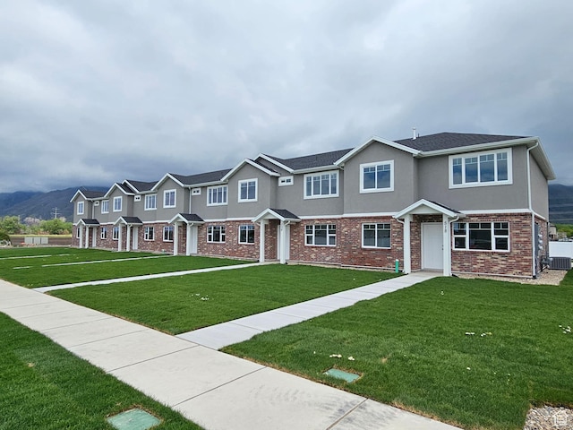 518 N 1400 W Lot 26, Springville, UT 84663 - multi unit property featuring a mountain view, stucco siding, brick siding, and a front yard