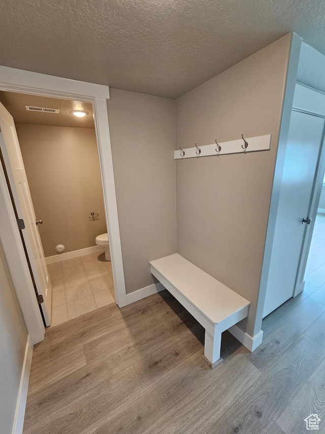 518 N 1400 W Lot 26, Springville, UT 84663 - mudroom featuring a textured ceiling, visible vents, wood finished floors, and baseboards