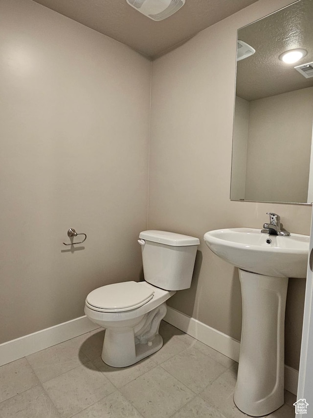 518 N 1400 W Lot 26, Springville, UT 84663 - half bath with toilet, a textured ceiling, baseboards, and visible vents