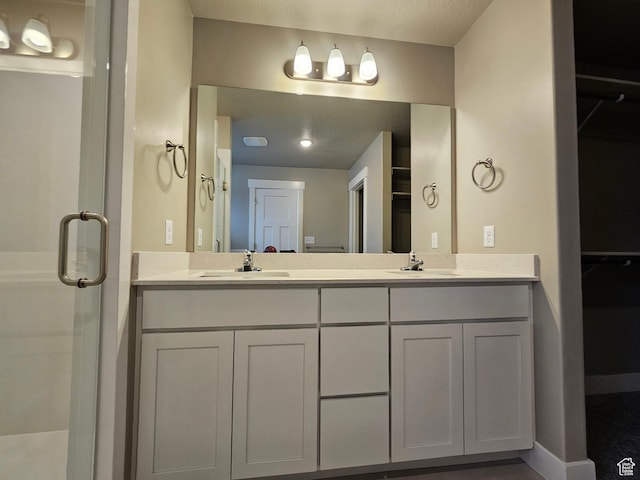 518 N 1400 W Lot 26, Springville, UT 84663 - bathroom with double vanity, a stall shower, and a sink