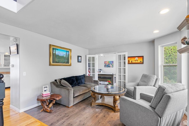 3470 W Maynard Ct, Riverton, UT 84065 - living room with recessed lighting, baseboards, and light wood-style floors