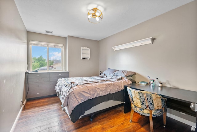 3470 W Maynard Ct, Riverton, UT 84065 - bedroom with baseboards, visible vents, and wood finished floors