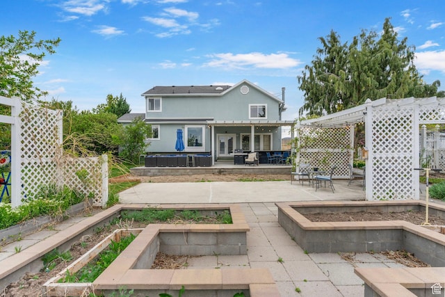 3470 W Maynard Ct, Riverton, UT 84065 - rear view of house featuring fence, a patio, and a garden