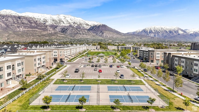birds eye view of property featuring a mountain view
