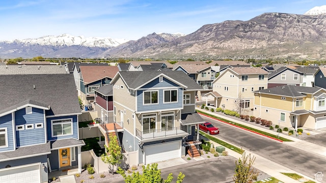exterior space featuring a residential view and a mountain view