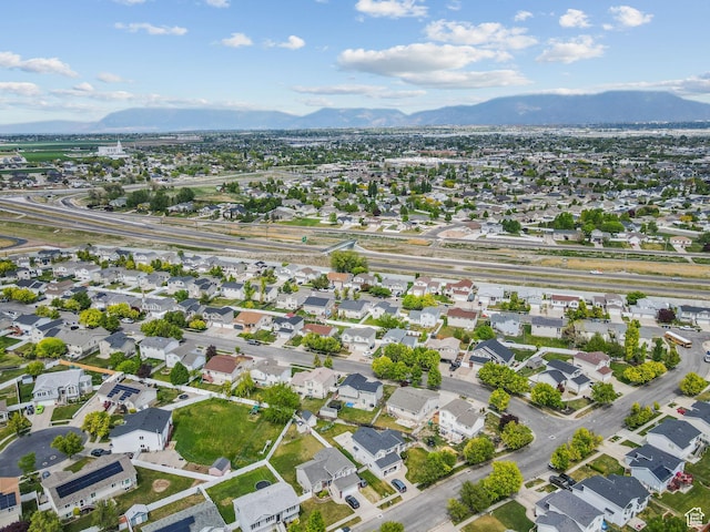 aerial view featuring a mountain view and a residential view