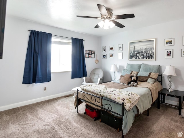 bedroom with baseboards, ceiling fan, and carpet floors