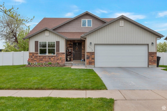 craftsman house featuring stone siding, roof with shingles, fence, and a garage