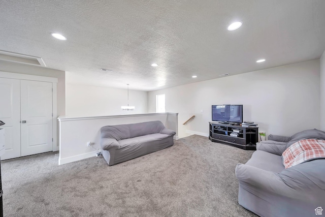 2882 S Allison Way W, Syracuse, UT 84075 - carpeted living room with a textured ceiling, recessed lighting, and baseboards