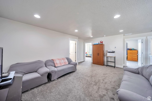 2882 S Allison Way W, Syracuse, UT 84075 - living room with a textured ceiling, light colored carpet, recessed lighting, and baseboards