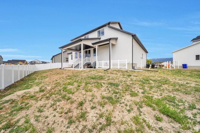 2882 S Allison Way W, Syracuse, UT 84075 - back of house with a fenced backyard