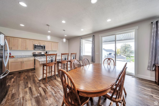 2882 S Allison Way W, Syracuse, UT 84075 - dining room featuring a textured ceiling, recessed lighting, dark wood-style flooring, and baseboards
