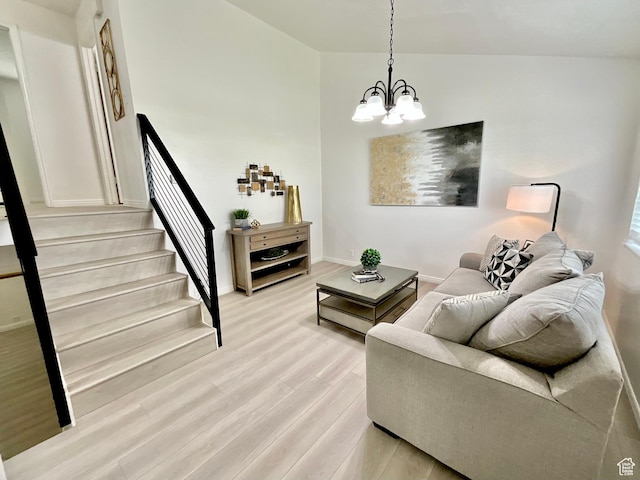 2610 S 8000 W, Magna, UT 84044 - living room with light wood finished floors, a chandelier, baseboards, and stairway