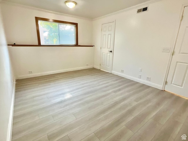 2610 S 8000 W, Magna, UT 84044 - unfurnished bedroom featuring ornamental molding, baseboards, visible vents, and wood finished floors