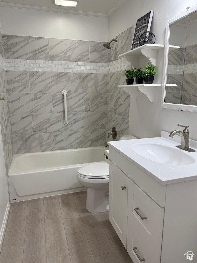 2610 S 8000 W, Magna, UT 84044 - bathroom featuring toilet, wood finished floors, vanity, ornamental molding, and shower / bathtub combination