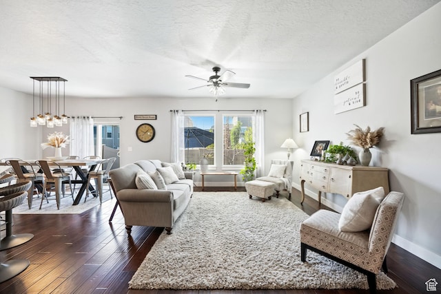 1559 W 430 N, Lindon, UT 84042 - living room featuring baseboards, a ceiling fan, plenty of natural light, and dark wood-type flooring