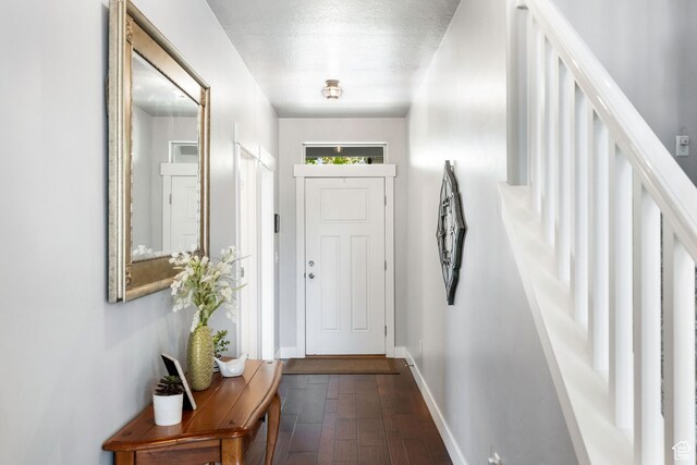 1559 W 430 N, Lindon, UT 84042 - doorway to outside featuring dark wood-style flooring, baseboards, and stairs