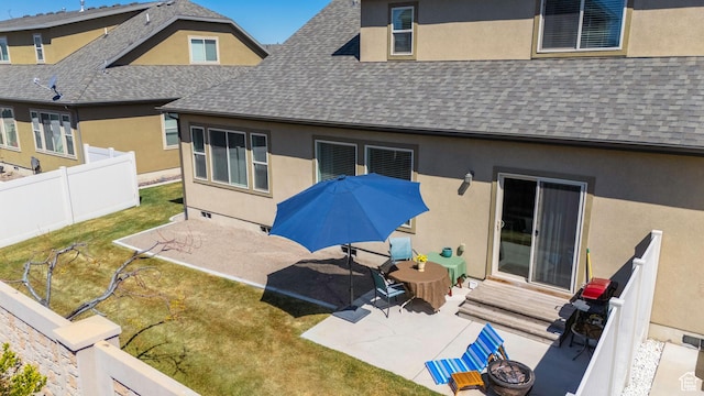 1559 W 430 N, Lindon, UT 84042 - back of property with a fire pit, stucco siding, fence, a shingled roof, and a patio area
