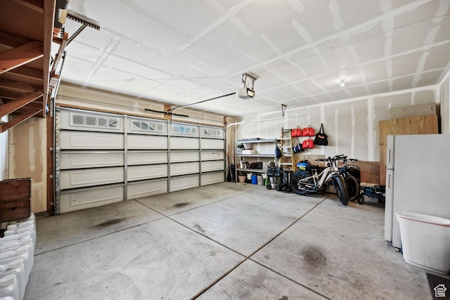 1559 W 430 N, Lindon, UT 84042 - garage with freestanding refrigerator and a garage door opener