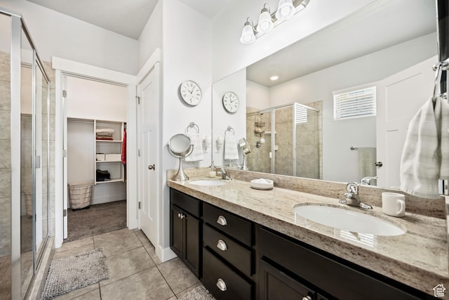 1559 W 430 N, Lindon, UT 84042 - full bathroom with a stall shower, tile patterned flooring, a sink, and a walk in closet