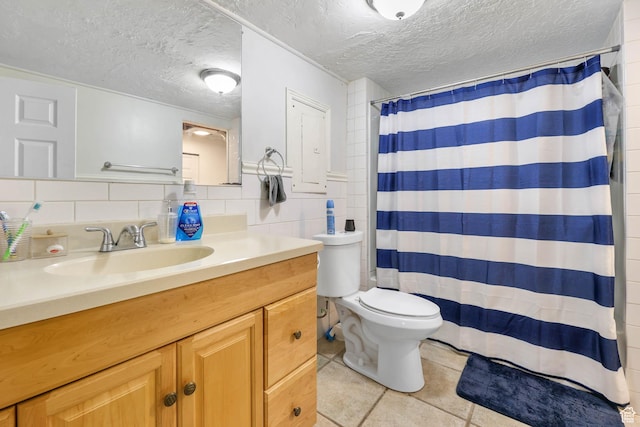173 W 300 N, Bountiful, UT 84010 - bathroom with tile patterned flooring, vanity, a textured ceiling, toilet, and a shower with shower curtain