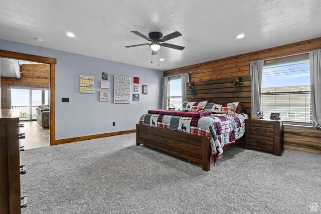 1504 N Sculpin Loop, Garden City, UT 84028 - carpeted bedroom with multiple windows, baseboards, a ceiling fan, and recessed lighting