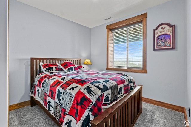1504 N Sculpin Loop, Garden City, UT 84028 - bedroom with carpet flooring, visible vents, and baseboards