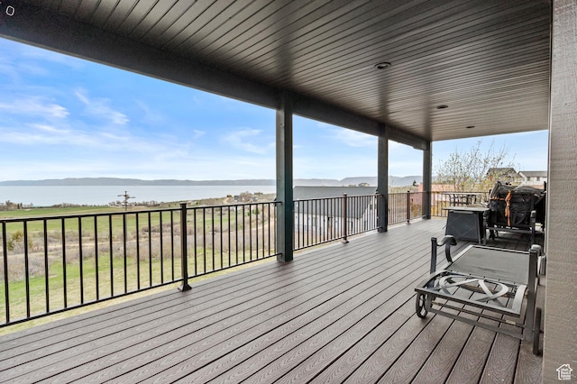 1504 N Sculpin Loop, Garden City, UT 84028 - wooden terrace with a water view