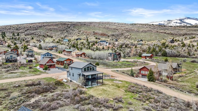 1504 N Sculpin Loop, Garden City, UT 84028 - drone / aerial view featuring a mountain view and a residential view