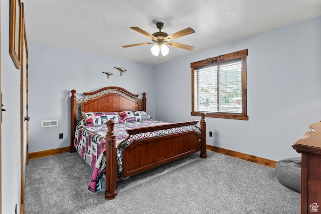 1504 N Sculpin Loop, Garden City, UT 84028 - bedroom featuring carpet flooring, visible vents, baseboards, and ceiling fan