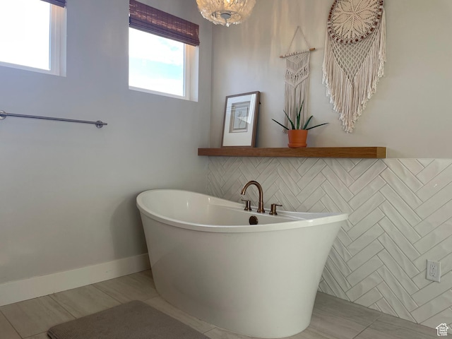 bathroom with a freestanding bath