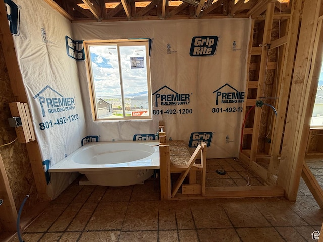 full bath featuring a garden tub