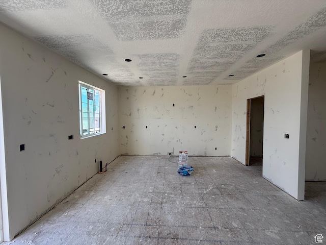 4047 N Ophir Dr, Eagle Mountain, UT 84005 - spare room featuring a textured ceiling