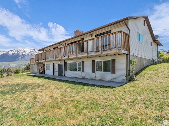 862 E 400 S, Payson, UT 84651 - rear view of house featuring a patio area, a yard, a deck with mountain view, and stairs