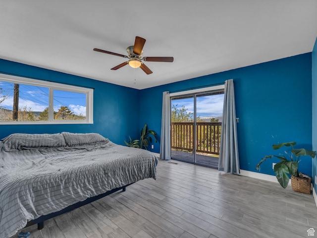 862 E 400 S, Payson, UT 84651 - bedroom featuring wood finished floors, visible vents, a ceiling fan, baseboards, and access to exterior