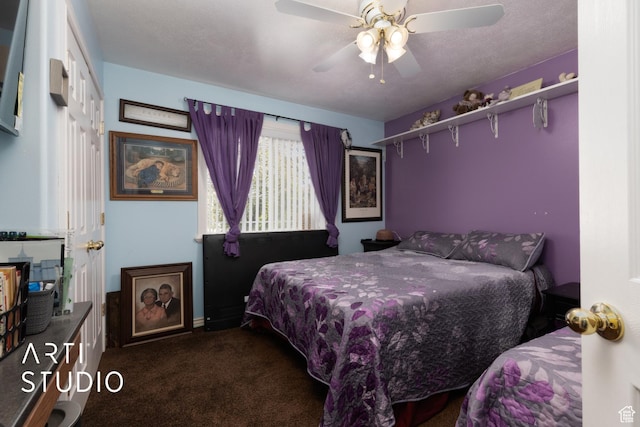carpeted bedroom featuring ceiling fan