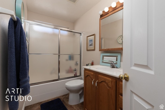 full bathroom with toilet, visible vents, bath / shower combo with glass door, and vanity
