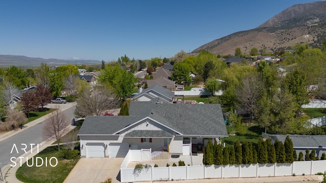 bird's eye view featuring a residential view and a mountain view