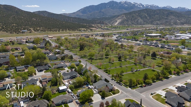 aerial view with a mountain view and a residential view