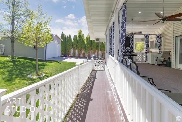 balcony with a ceiling fan