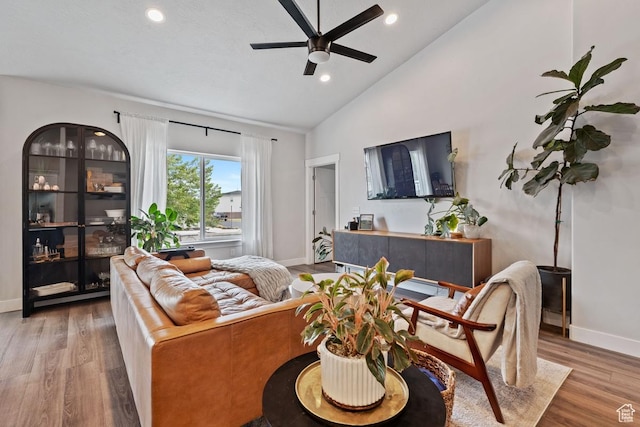 151 N 410th St S, Vineyard, UT 84059 - living area with ceiling fan, wood finished floors, baseboards, recessed lighting, and high vaulted ceiling