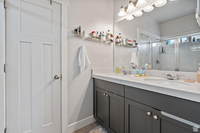 151 N 410th St S, Vineyard, UT 84059 - bathroom featuring a shower stall, double vanity, and baseboards