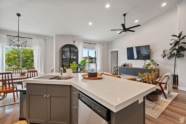 151 N 410th St S, Vineyard, UT 84059 - kitchen featuring stainless steel dishwasher, gray cabinets, open floor plan, a chandelier, and wood finished floors