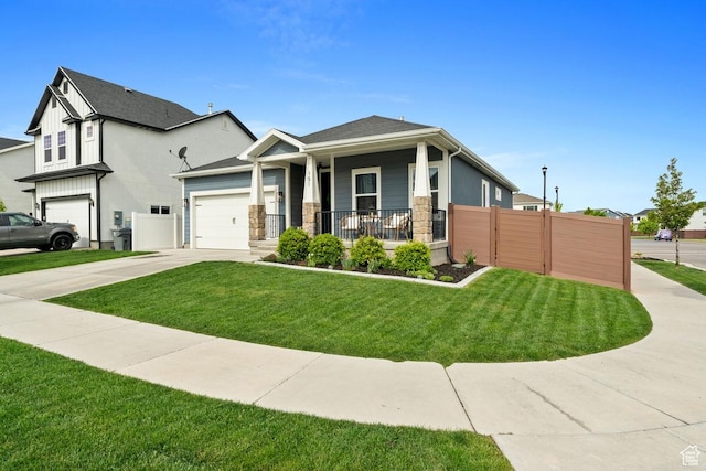 151 N 410th St S, Vineyard, UT 84059 - view of front of house featuring covered porch, driveway, an attached garage, and stone siding