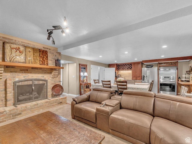 4760 S Meadow Creek Ln E, Ogden, UT 84403 - living room with a brick fireplace, recessed lighting, and baseboards