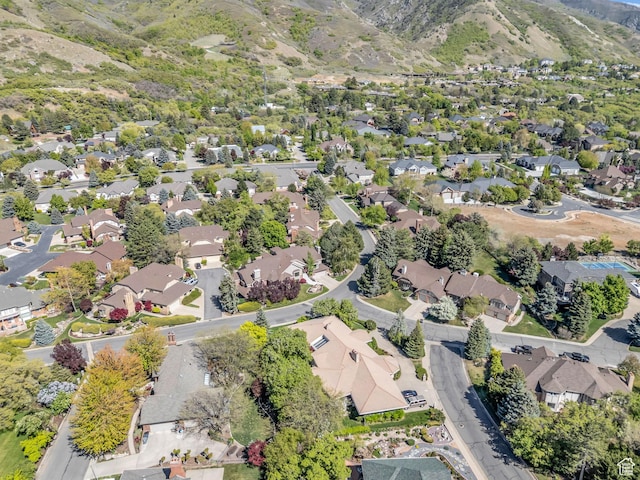 4760 S Meadow Creek Ln E, Ogden, UT 84403 - aerial view of property's location featuring nearby suburban area and a mountain backdrop