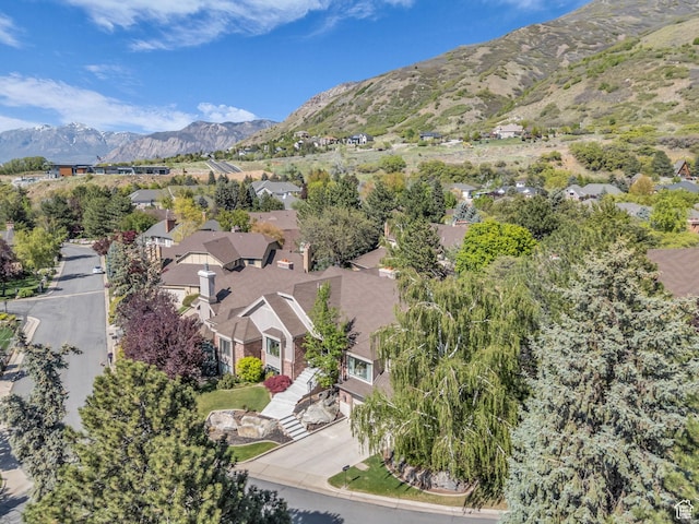 4760 S Meadow Creek Ln E, Ogden, UT 84403 - aerial overview of property's location with mountains and nearby suburban area