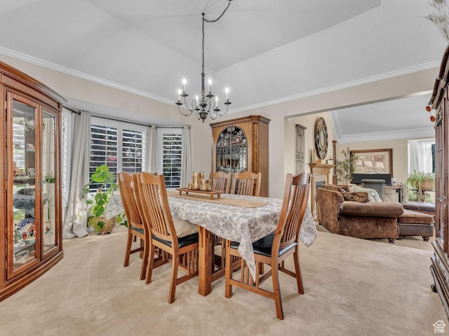 4760 S Meadow Creek Ln E, Ogden, UT 84403 - dining area featuring light colored carpet, a chandelier, crown molding, and vaulted ceiling