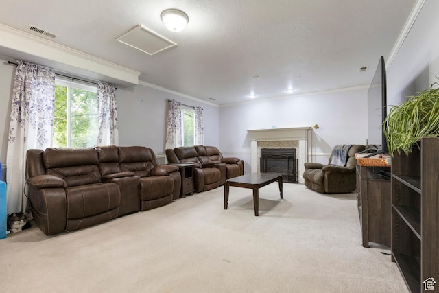 living area featuring crown molding, light carpet, plenty of natural light, and a fireplace