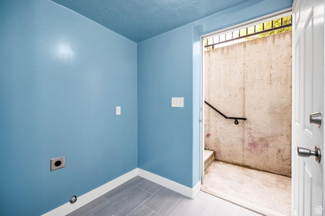 739 N 500 E, Logan, UT 84321 - laundry room featuring electric dryer hookup and baseboards